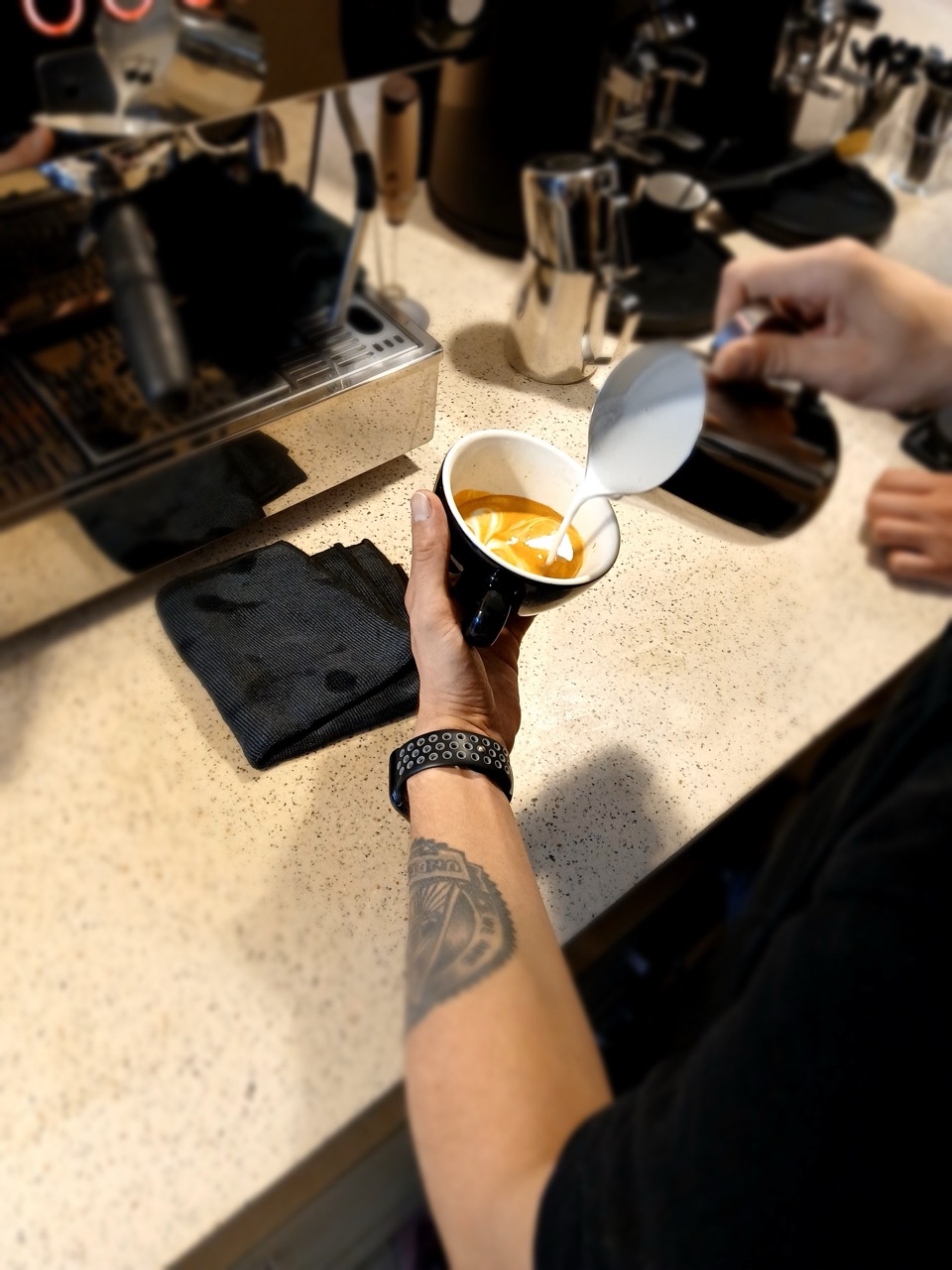 Latte art at Alt Benestar Cafè